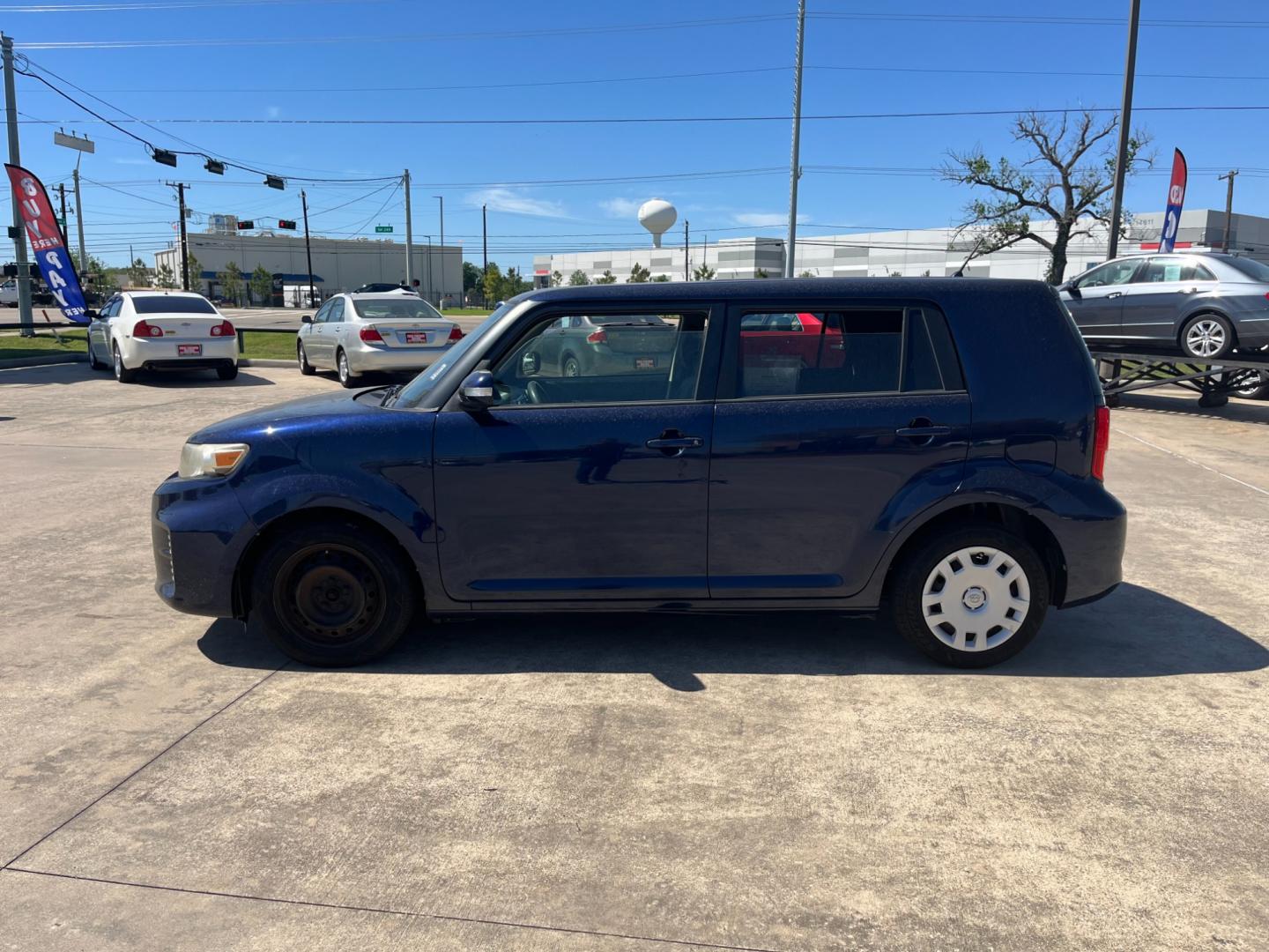 2014 blue /black Scion xB (JTLZE4FE1EJ) , Automatic transmission, located at 14700 Tomball Parkway 249, Houston, TX, 77086, (281) 444-2200, 29.928619, -95.504074 - Photo#3